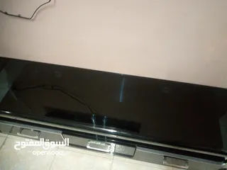  8 طاوله شاشه للبيع  طاوله شاشه لامع الحاله جيده شبه جديده للبيع