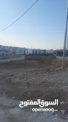  2 ارض للبيع في جاوا على شارع مادبا تقع على شارعين
