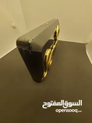  15 حقيبة كلاتش من ماركة كيليان ذا تمبتريس سوداء وراقيه ،Black Clutch The Temptress by Kilian
