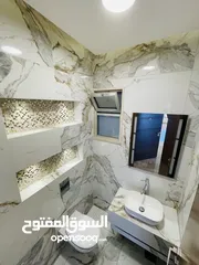 13 شقه في ضاحية النخيل للبيع فاخره جدا موقع مميز مطله على طريق المطار