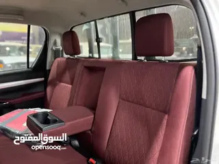  28 تويوتا هايلكس S-GLX اعلى المواصفات باللون الابيض المميز 2024