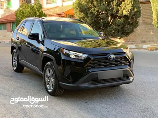  10 تيوتا رافور هايبرد 2023 xle لون اسود ملوكي جمرك اليوم اعلى صنف