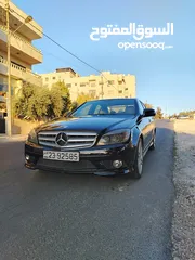  10 مرسيدس C200 2009 لون اسود اعلى صنف AMG kit فحص كامل للبيع