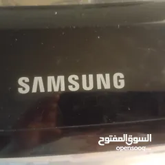  1 غساله ملابس نوع سامسونج عشرة كيلو باب من فوق توفير مياه