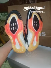  9 حذاء adidas UltraBoost 22 Black Flash Orange اصلي بنص سعره بسعر مغري جدا الفضل للمشي والراحة