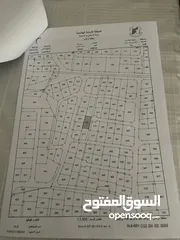  2 قطعة ارض بما عليها من بناء