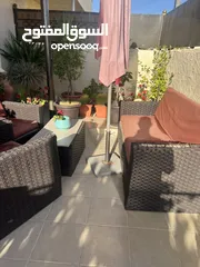  7 طقم راتان ومظلة ومرجيحة