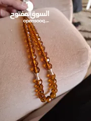  1 مسبحه كهرمان قديم  33 حبه