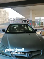  1 هوندا سيفيك 2004...للبيع او .....للبدل ع فورد cmax............