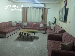  2 كنب مع طاولات وبرداي وسجادة