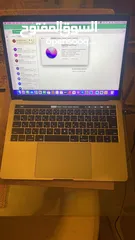  2 MacBook Pro 2016 with touch bar