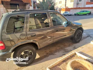  3 كيا سبورتج 2002 بحاله جيده جدا