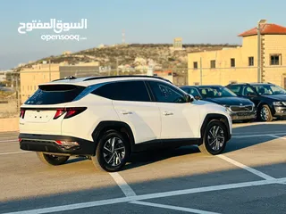  2 هونداي توسان هايبرد ترخيص 2022 ماشية فقط 24 الف ولا غرام بوية وبحالة ممتازة جدا