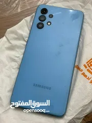  1 128 g samsung a32 6 ram 64 mega pixels 32 mega pixels 5000 milli ampere معاه الكرتونة و الشاحن ....