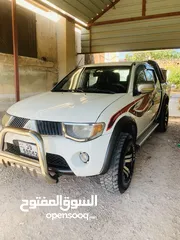  12 بكم ميتسوبيشي l200