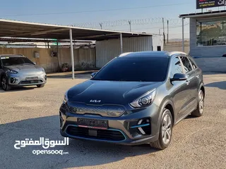  1 كيا نيرو 2022 فل مع فتحة بحالة الوكالة 7جيد
