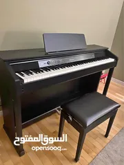  1 بيانو ماركه خشبي كهربائي casio اليابانية المعروفه