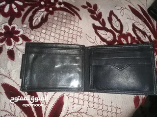  2 محافظ عدد اتنين جديد ووحده مستعمله اسبوع بحالة الوكاله