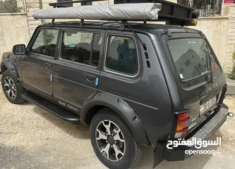  8 لادا أوربان 2019  مجهزة تجهيز كامل للرحلات والتخييم والصيد سيارة قوية وعملية بحال الوكالة