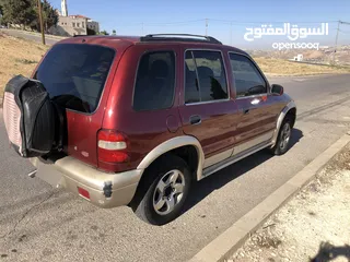  4 كيا سبورتج موديل 2000 بحالة جيدة جدا