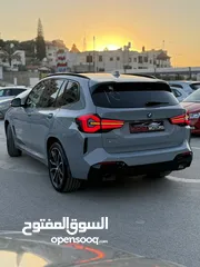  18 BMW x3 30e ترخيص 2022 ترخيص  محرك 2000 هايبرد plug in/يقطع على الشحنه 30 كيلو متر  293 حصان