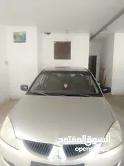  7 ميتسوبيشي لانسر موديل 2005 قير عادي للبيع