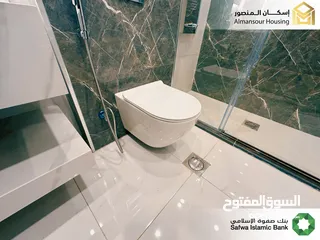  15 شقة ارضي معلق يمين 85م2 فاخرة للبيع في خلدا/ مشروع مكة مول 5 (2/2) ( إسكان المنصور )