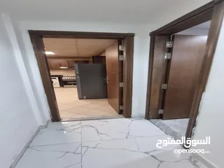  18 للايجار الشهري شقة غرفتين و صالة مفروشة في أبراج الواحة في عجمان بمنطقة الراشدية