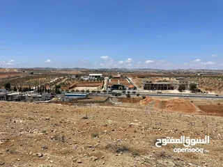  10 للبيع ارض بجانب جامعة اربد الاهلية مع اجمل اطلالة ومقابل جامعة جدارا مفروزة قوشان مستقل شارعيين