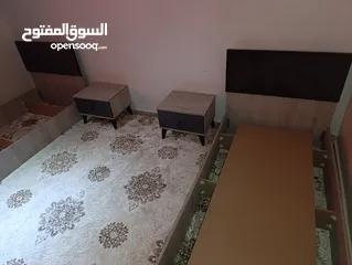  1 زوز اسرة بالرفوف متعهم