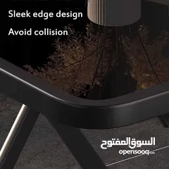  4 طاولة و 4 كراسي هيكل ستيل قوي ومتين مع سطح زجاجي ، قابل للطي لتوفير المساحه