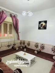  13 شقة كبيرة دور أول بشارع جمال عبدالناصر الزاوية / ع الرئيسي