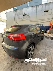  9 كيا ريو هاتشباك 2013