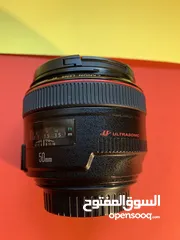  3 عدسة كانون canon 50mm 1.2 بحال الوكالة