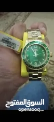  1 invicta wach gold with green