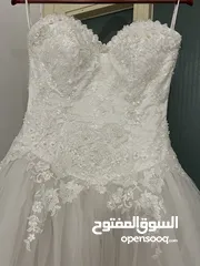  1 S-M Wedding dress with veil.