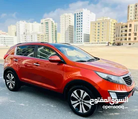  1 KIA SPORTAGE 2013 ORANGE GCC WITH SUNROOF