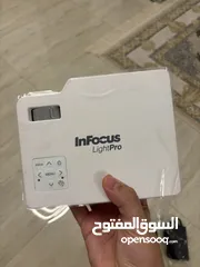  1 Infocus portable projector