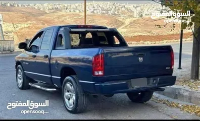  2 دودج رام 2005 فل الفل ما شاء الله عليه لون ازرق ، هيمي 6 ركاب ماتور 5700 فحص 4 جيد ضربات خفيفة بودي
