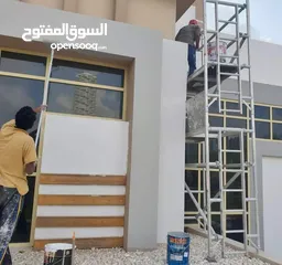  3 VILA PAINTING WORKING OUTSIDE