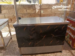  3 طاولات ستانلس وعرباية عصير
