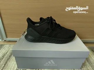  3 Adidas black shoes