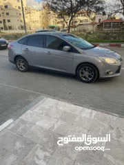  2 فورد فوكس ترخيص 2013 اوتوماتيك اصل الماني دفعه 15 والباقي شيكات