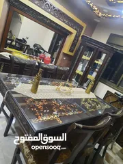  6 طاولة سفرة مع 8 كراسي تم تفصيله ومعها لوح زجاجي عازل للحراره