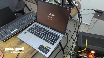  1 Acer Swift GO 14 مستعمل بوضع الجديد، استخدام أيام فقط، شاشة لمس OLED ويدعم البصمة