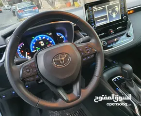  1 تويوتا كورولا 2022 XLE فحص كامل فل كامل جلد تدفئة شاحن وايرلس كراسي كهروباء ياباني بطارية ليثيوم