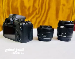  1 كاميرا كانون 850D مع عدسة 50mm  وعدسة كت 55_18