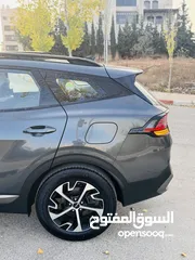  12 كيا سبورتاج هايبرد 2023 فل كامل مع بانوراما - باللون المميز والداخلية المميزة - والسعر المميز