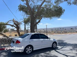  6 كيا سيراتو 2008 ماتور 1600 بنزين اوتومات عدد 2 لون ابيض ولون اسود