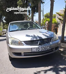  5 متسوبيشي لانسر موديل 2005  محرك 1300 سي سي  للبيع